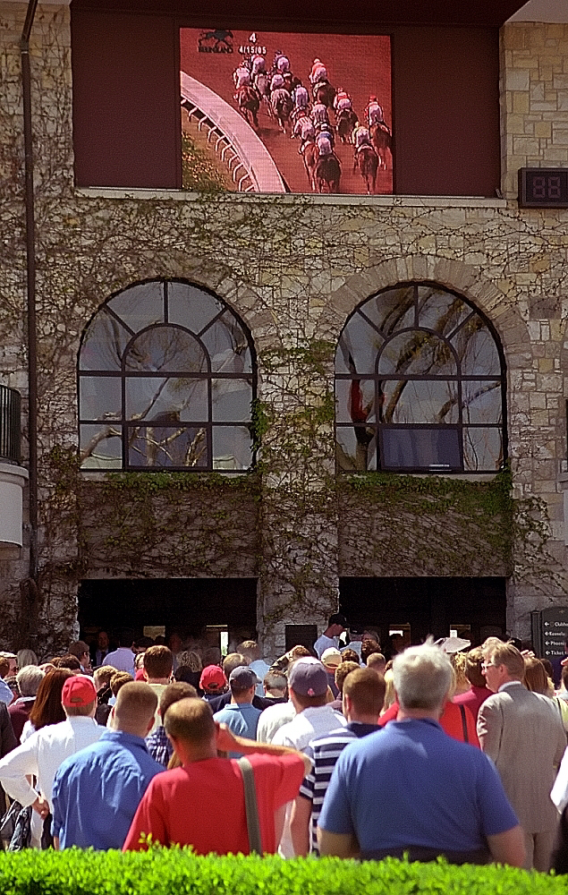 Spectators and racehorses at Keeneland in Lexington, Kentucky